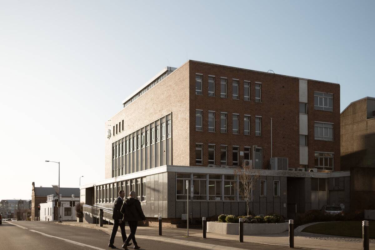 James and J walking to court